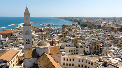 Naklejka premium Aerial view of the tower bell of Basilica of Saint Sabinus in Bari, Puglia, Italy. It's the cathedral of city and it's located in the historic center of the city called Old Bari, near seaside and port