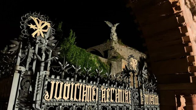 Night view of the famous gothic cemetery of Comillas in Cantabria, Spain. High quality 4k footage