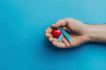 World diabetes day and awareness blue ribbon with red blood drop in man's hand with copy space isolated on blue background. World Diabetes Day is on November 14. generative ai