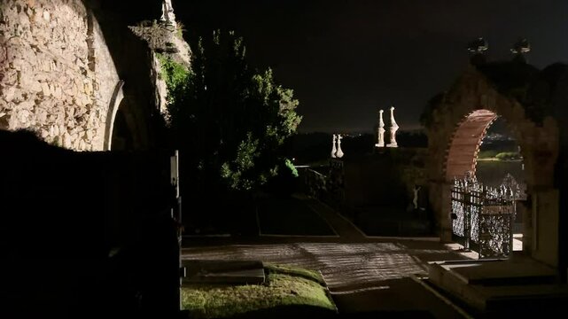 Night view of the famous gothic cemetery of Comillas in Cantabria, Spain. High quality 4k footage