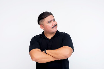 Fototapeta premium Candid shot of a middle aged man putting up clues, slowly realizing he has been duped and swindled. Isolated on a white background.
