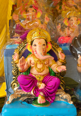 Indian Hindu God Lord Ganesha Statues made of clay and soil, Coated with color sold for Ganesh Chathurthi