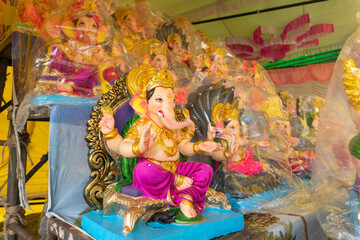 Indian Hindu God Lord Ganesha Statues made of clay and soil, Coated with color sold for Ganesh Chathurthi