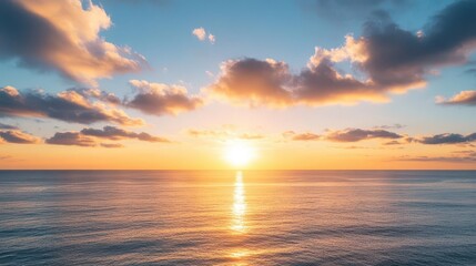 Obraz premium Sunrise over a calm ocean, symbolizing new beginnings and fresh starts