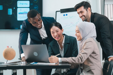 Successful Business Team in Office Cooperation, Professional Partnership Communication Highlighted as Colleagues Shake Hands and Collaborate, Teamwork Group Success in Corporate Setting