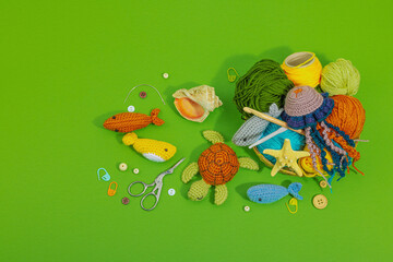Set of clew of thread for knitting. Crocheted different underwater animals, marine hobby concept