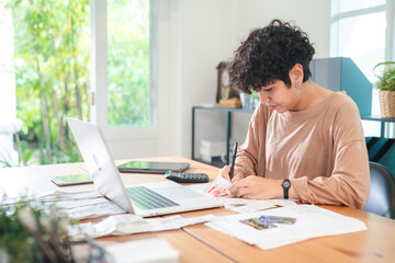 Obraz premium Modern Businesswoman Working from Home, Young Female Entrepreneur Using Laptop for Freelance Projects in Cyberspace, Embracing Technology Communication for a Flexible Lifestyle, Online Business