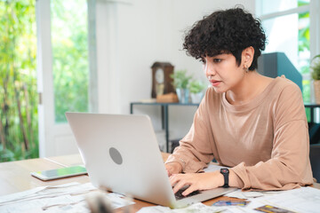 Modern Businesswoman Working from Home, Young Female Entrepreneur Using Laptop for Freelance Projects in Cyberspace, Embracing Technology Communication for a Flexible Lifestyle, Online Business