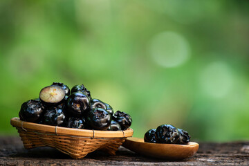 Blueberry or Vaccinium sect. Cyanococcus fruits on natural background.