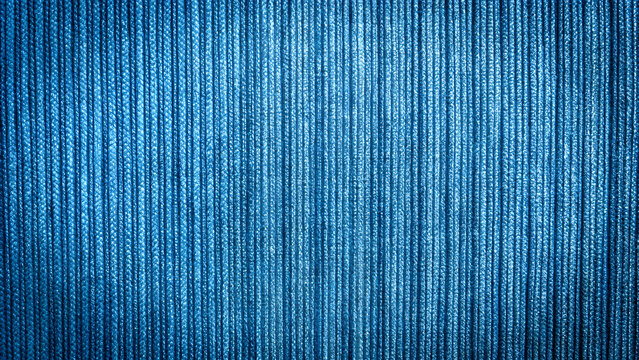 Smooth, horizontal lines on a vibrant blue texture abstract background with a metallic finish rich blue textured surface with a subtle metallic sheen and parallel lines.