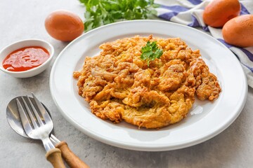 Thai style omelet stuff minced pork ,street food of thailand ,Thai call kai jeaw moo sab , Top view food table	