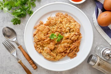 Thai style omelet stuff minced pork ,street food of thailand ,Thai call kai jeaw moo sab , Top view food table	