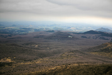 High-angle view of the small volcanoes and craters in Jeju Island
