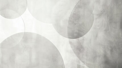 A simple, abstract image of white circles on a gray background.
