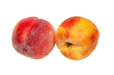 Two wet ripe peaches with visible water drops isolated on white background. Vitamins, diet, health.
