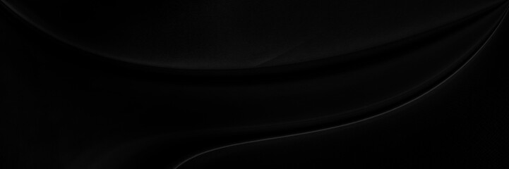 Black gray satin dark fabric texture luxurious shiny that is abstract silk cloth background with patterns soft waves blur beautiful.