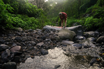 The muslim prayer for god on the big rock in nature