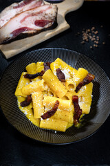 Pasta alla carbonara is the name of a type of pasta cooked with pork cheek, pecorino cheese and pepper, typical of the culinary tradition of Rome and the Lazio region in Italy.