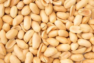 たくさんのバターピーナッツのクローズアップ背景