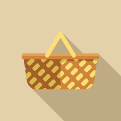 Obraz premium Empty wicker picnic basket with a checkered pattern is casting a long shadow on a light brown background