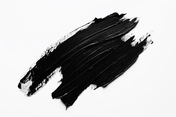 bright black brush stroke of paint on white background