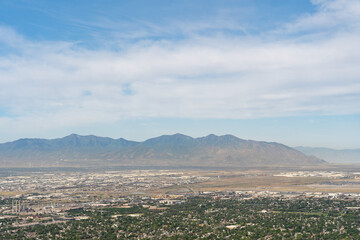 Obraz premium Sunny views of the Salt Lake Valley and Wasatch Range from atop Ensign Peak.