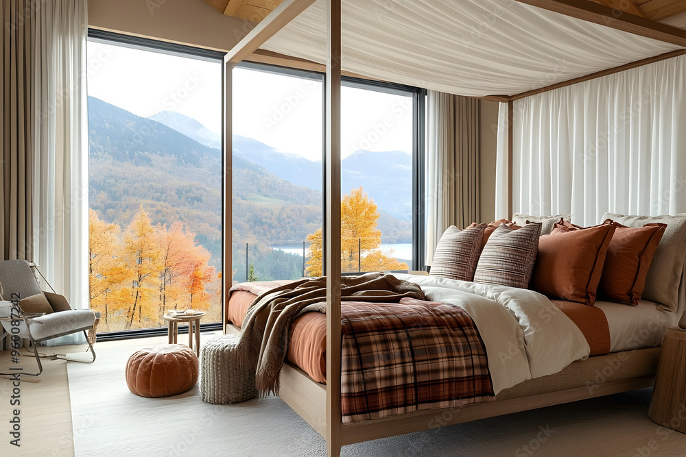 Wall mural luxurious bedroom featuring a wooden canopy bed with plaid and terracotta colored pillows. The room has large floor-to-ceiling windows offering a scenic autumn mountain view