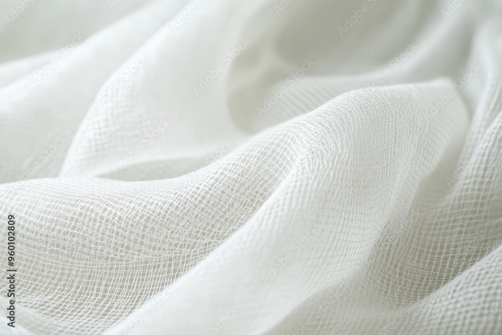 Poster a light white textured surface with a delicate, mesh-like pattern, giving the appearance of fine net