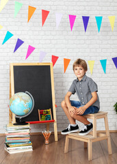Boy  posing for the first day at school