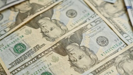 United states banknotes showcasing multiple twenty-dollar bills depicting financial wealth in an american currency setting.
