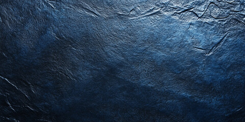 A blue textured surface with a soft, velvety finish, giving the surface a rich, luxurious feel with a deep, matte tone.