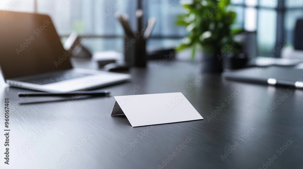Poster a modern business card mockup in a sharp design, placed on a blurred background of an upscale office
