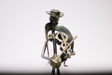 Sculpted Violinist: A Metallic Maestro