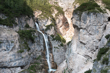 aerial view of the waterfalls produced in the fanes valley in veneto italy