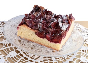 homemade tasty cake with plums close up