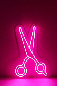 Pink neon sign scissors. Trendy style. Beauty style.  Neon sign. Custom neon. 