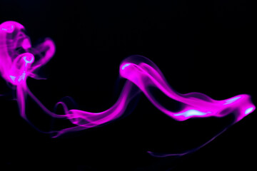 Illustration of pink beautiful smoke on the black background