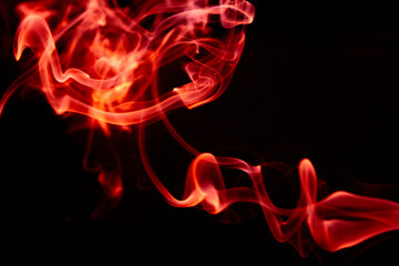 Illustration of red beautiful smoke on the black background