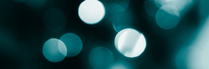 Blurred lights, dark blue background, banner texture. Abstract bokeh with soft light header