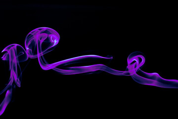 Illustration of purple beautiful smoke on the black background 