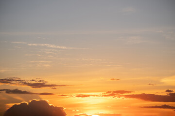 Beautiful , luxury soft gradient orange gold clouds and sunlight on the blue sky perfect for the background, take in everning,Twilight, Large size, high definition landscape photo