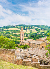 Obraz premium A view across rooftops towards the outskirts of the city in Urbino, Italy in summertime