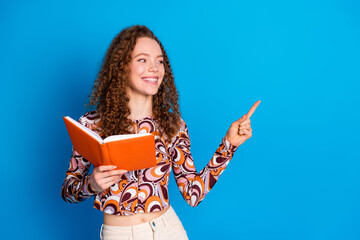 Photo portrait of lovely young lady read book point look empty space dressed stylish colorful...