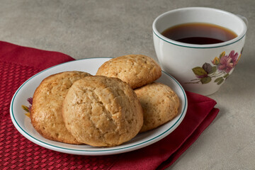 A plate with homemade cookies and a cup of coffee