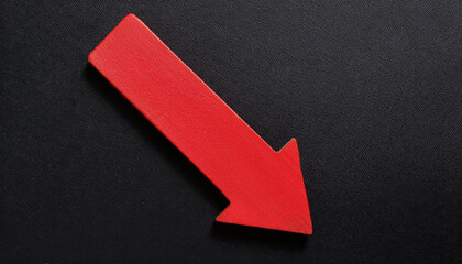 Fototapeta premium Red wooden arrow pointing down on black background. Business, market decline or economic