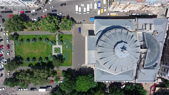 Romanian Atheneum in Bucharest. Aerial 4k video of this amazing landmark historical building from Bucharest, Romania, on Victoriei Avenue (Calea Victoriei). Travel to Romania.