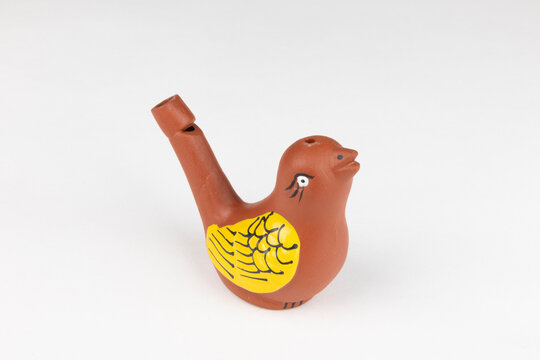 Traditional Clay Bird Whistle isolated on white background