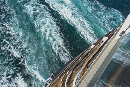 Fototapeta Breathtaking panoramic ocean views from outdoor deck of modern cruiseship cruise ship liner Queen Anne sailing at sea with blue sky and clouds