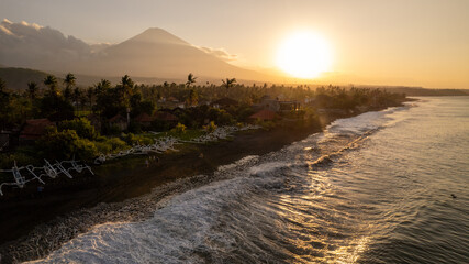 Amed beach in east Bali, popular diving and snorkeling tourist destination with majestic Agung...