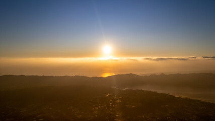 Stunning sunrise as seen from the famous volcano, Batur Mountain in Bali, Indonesia